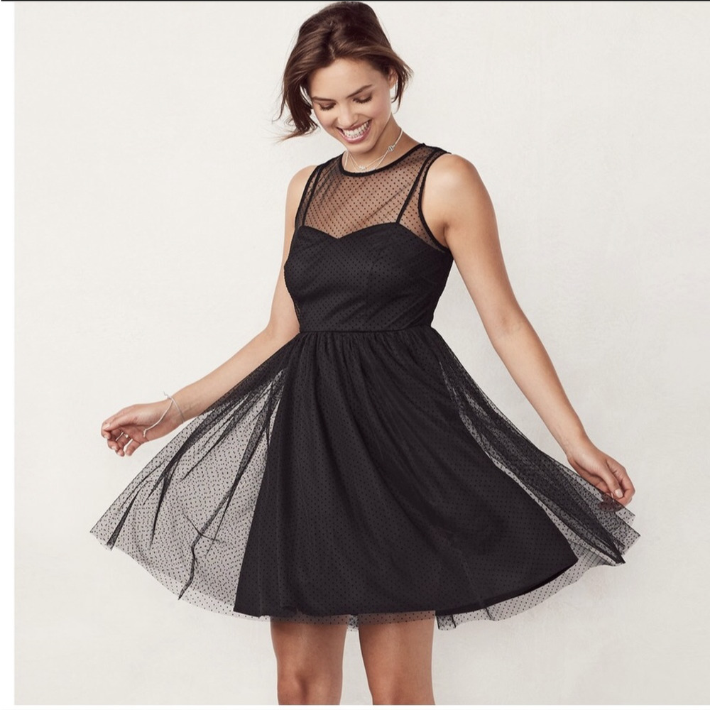 Lauren Conrad black cocktail dress size 12. Spaghetti straps, tulle skirt.